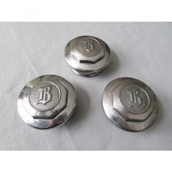 BUICK, 1930s, BRASS, CHROME OR NICKLE PLATED, GREASE CAPS. 3 IN NICE CONDITION. #1 image