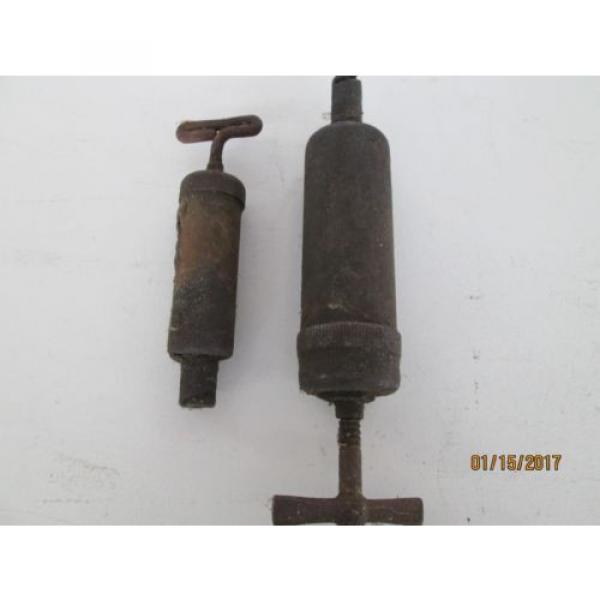 TWO SMALL VINTAGE GREASE GUNS #1 image